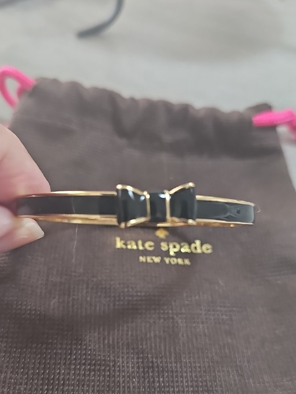 kate spade black and gold bow bangle bracelet